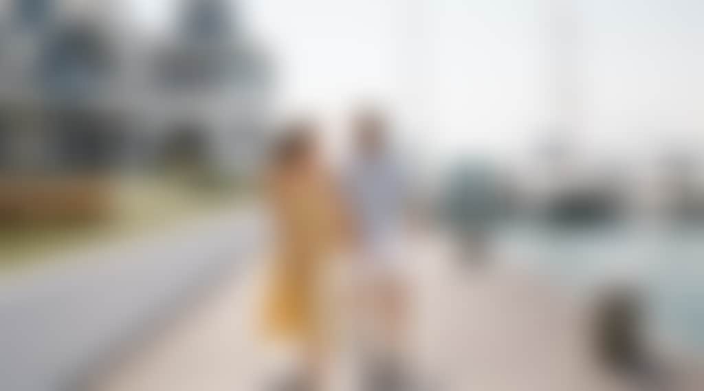 Couple walking at the marina