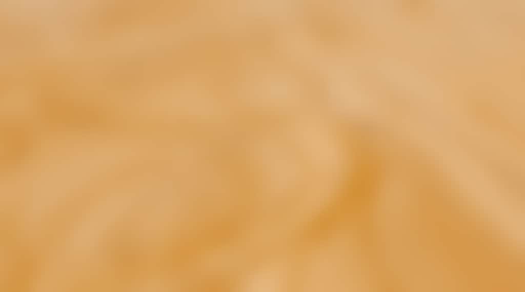 Aerial view of quad bikes riding on sand dunes in port stephens