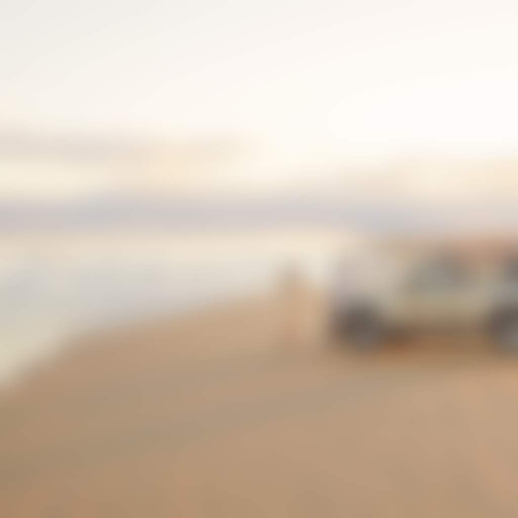 Stockton Beach Credit Tourism Australia Nov 2022 Car couple of Stockton beach632077 19 1