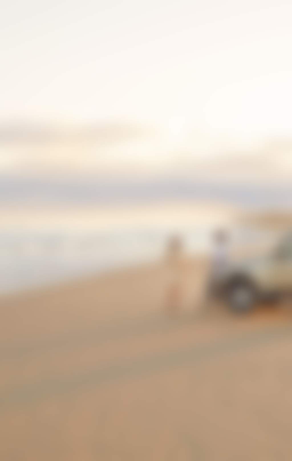 Stockton Beach Credit Tourism Australia Nov 2022 Car couple of Stockton beach632077 19 1