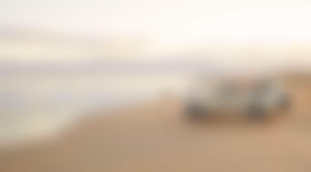 Stockton Beach Credit Tourism Australia Nov 2022 Car couple of Stockton beach632077 19 1