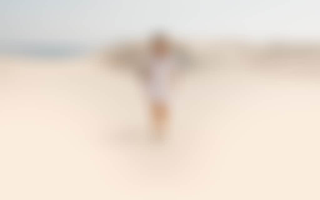 Person walking sand dunes
